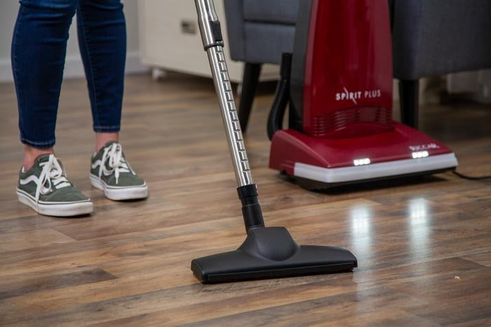 Cleaning a hardwood floor with the Spirit Plus bare floor tool and stainless steel wand
